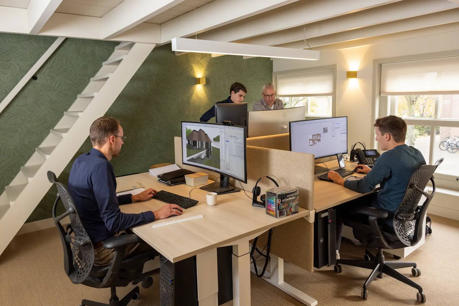 Woningontwerp team aan het werk.